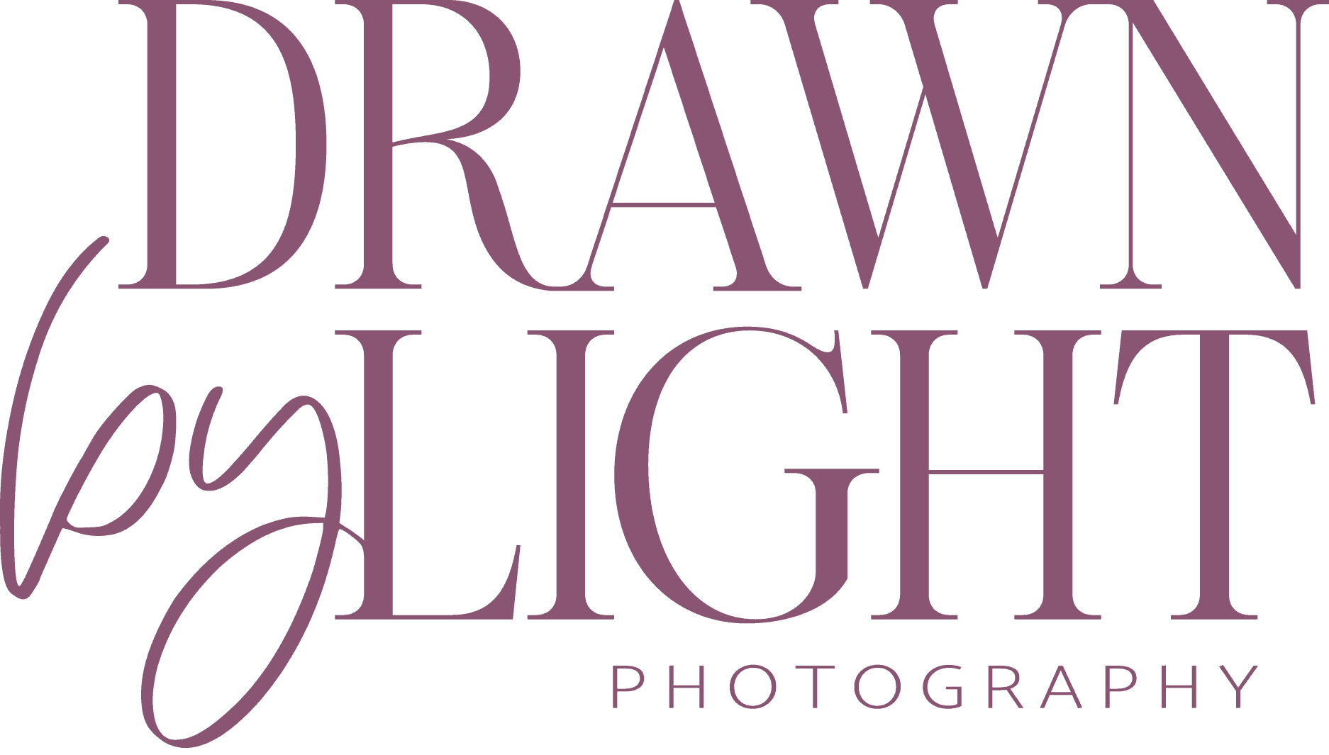Logo for "Drawn by Light Photography" in purple serif and script fonts on a light background. Drawn by Light Photography